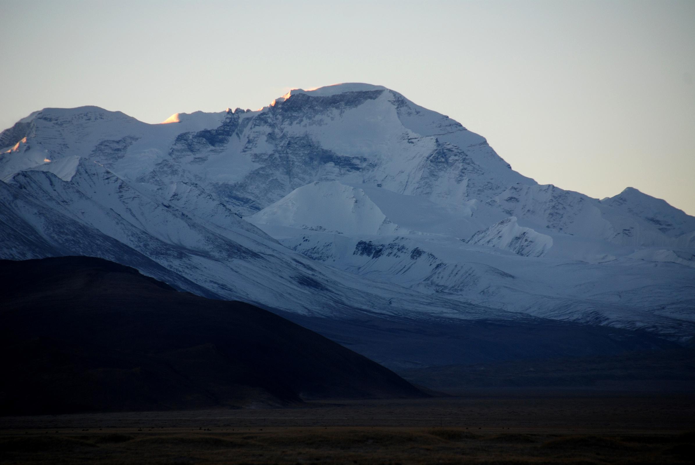 05 Cho Oyu Close Up At Sunrise From Across Tingri Plain Cho Oyu (8201m), the sixth highest mountain in the world, close up from Tingri at sunrise.